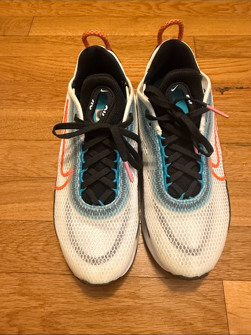 Nike Kids White Mesh Sneakers with Orange Swoosh and Teal Accents